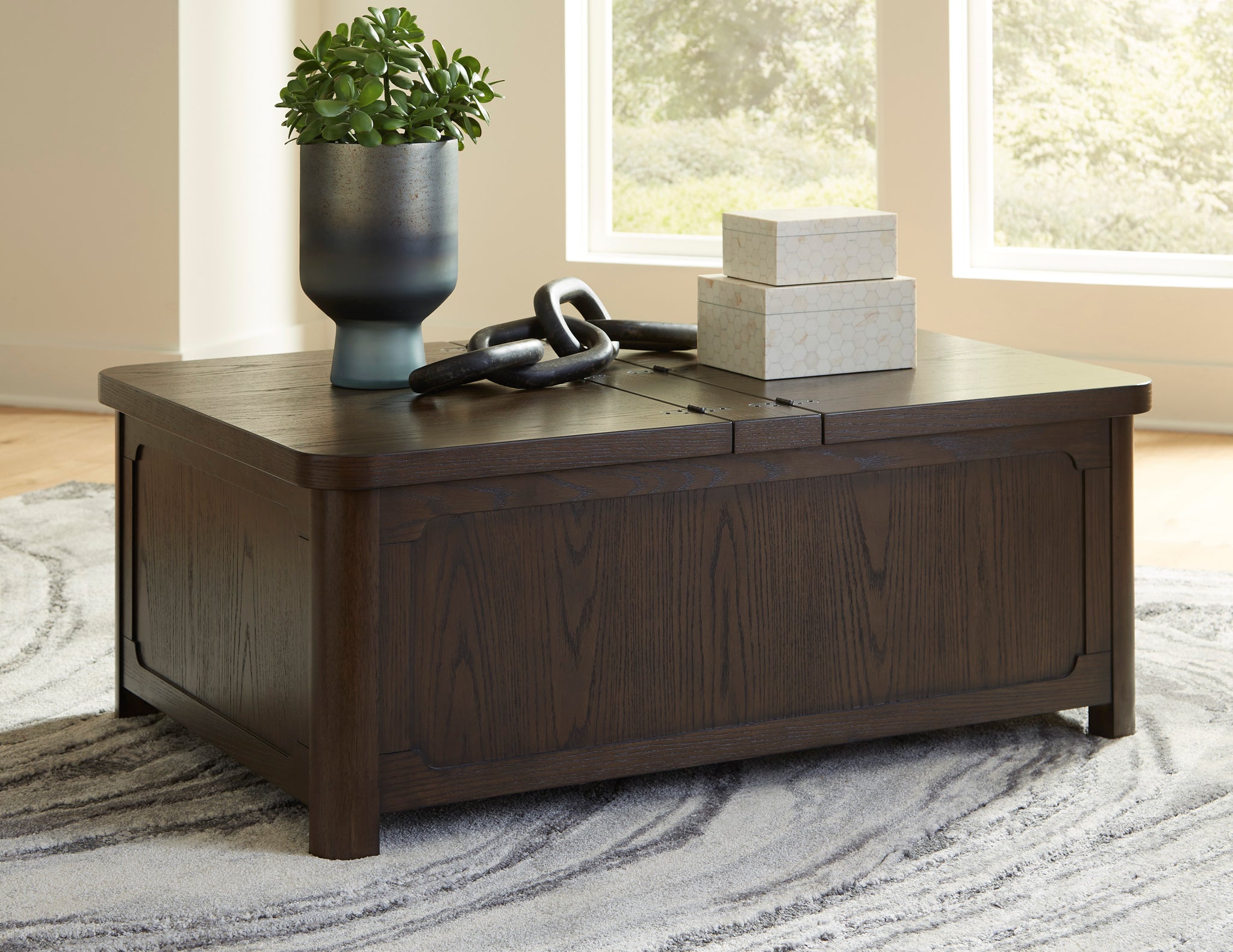 Breckington Cocktail Table with Storage - Dark Brown