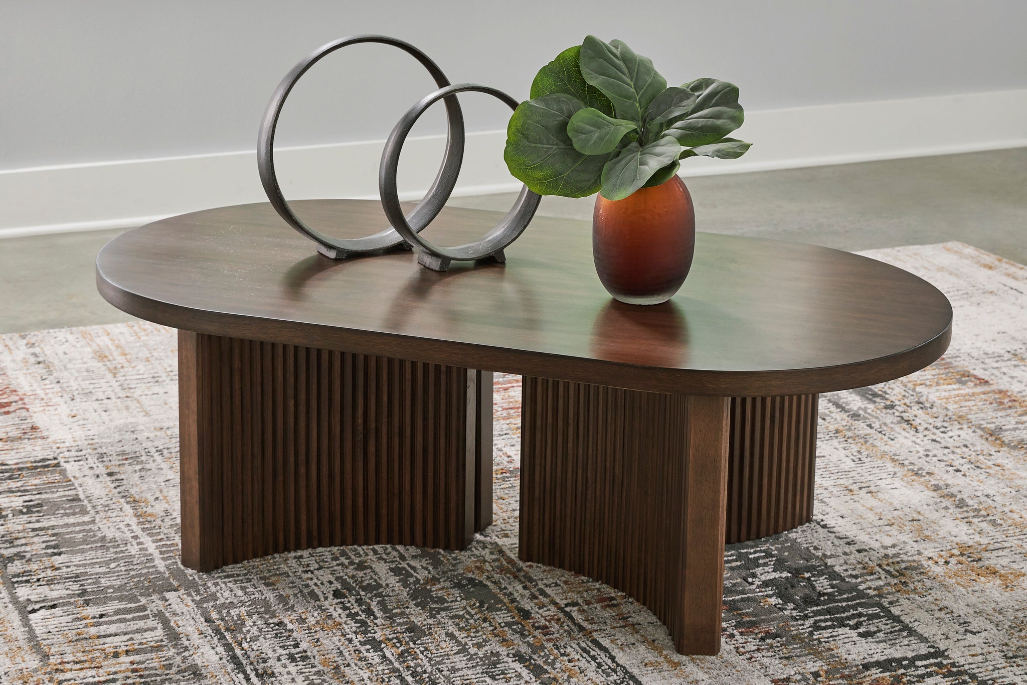 Korestone Oval Cocktail Table - Dark Brown